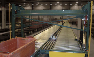 Hytrol puts the skinny on bulky conveyor diverters with space-saving rodless cylinder from Tolomatic